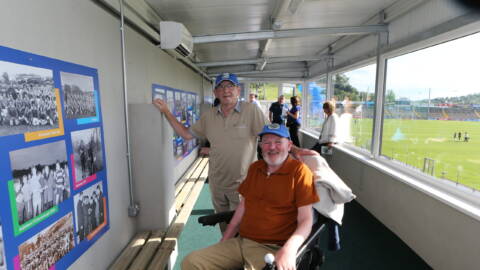 PJ Galligan and Thomas Doonan enjoying the picture wall in the new accessibility area in Kingspan Breffni